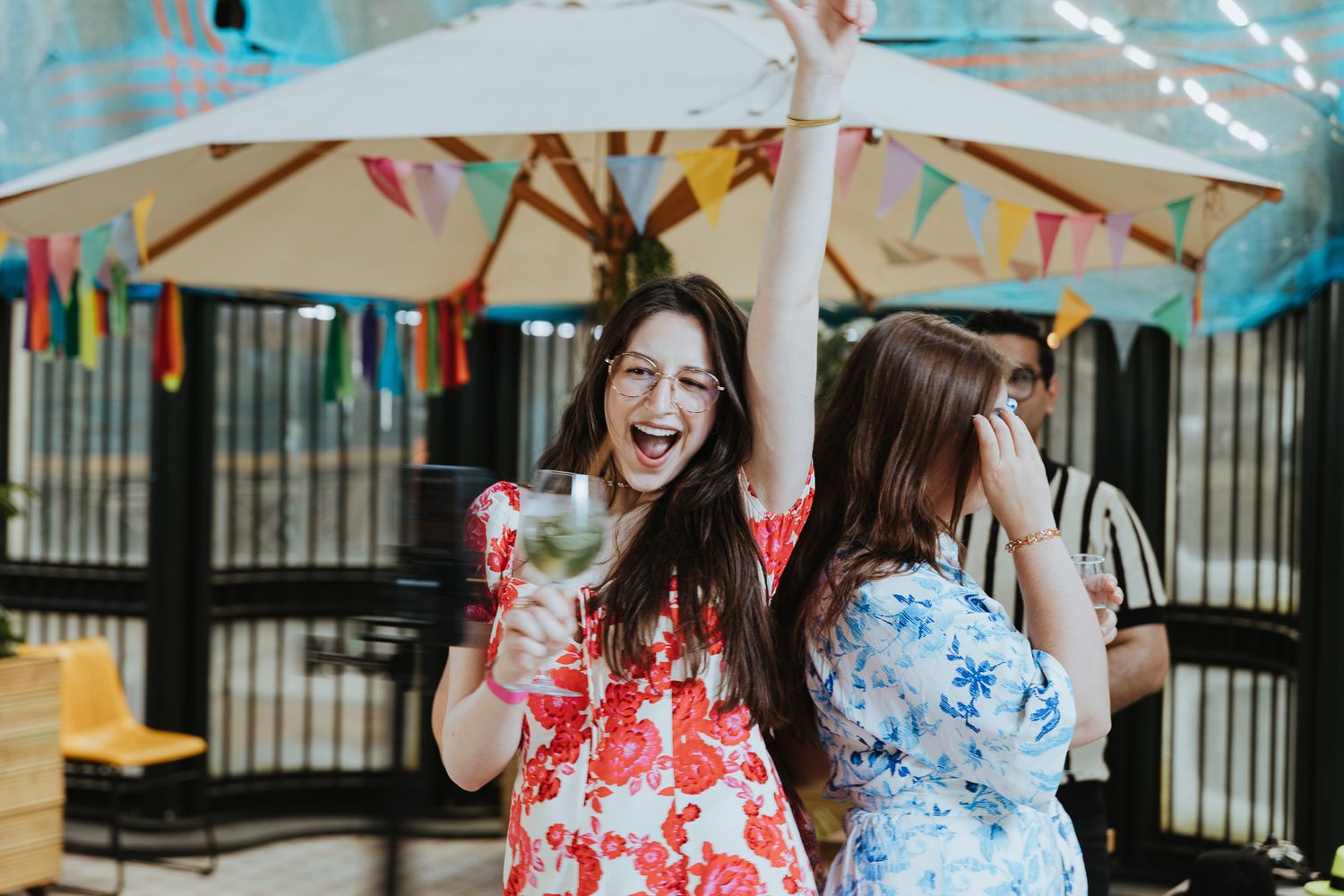 summer party photography in London – colleagues enjoying outdoor drinks