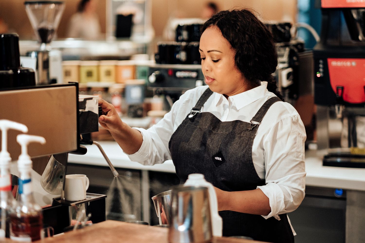 personal branding portrait in London – barista in modern café environment