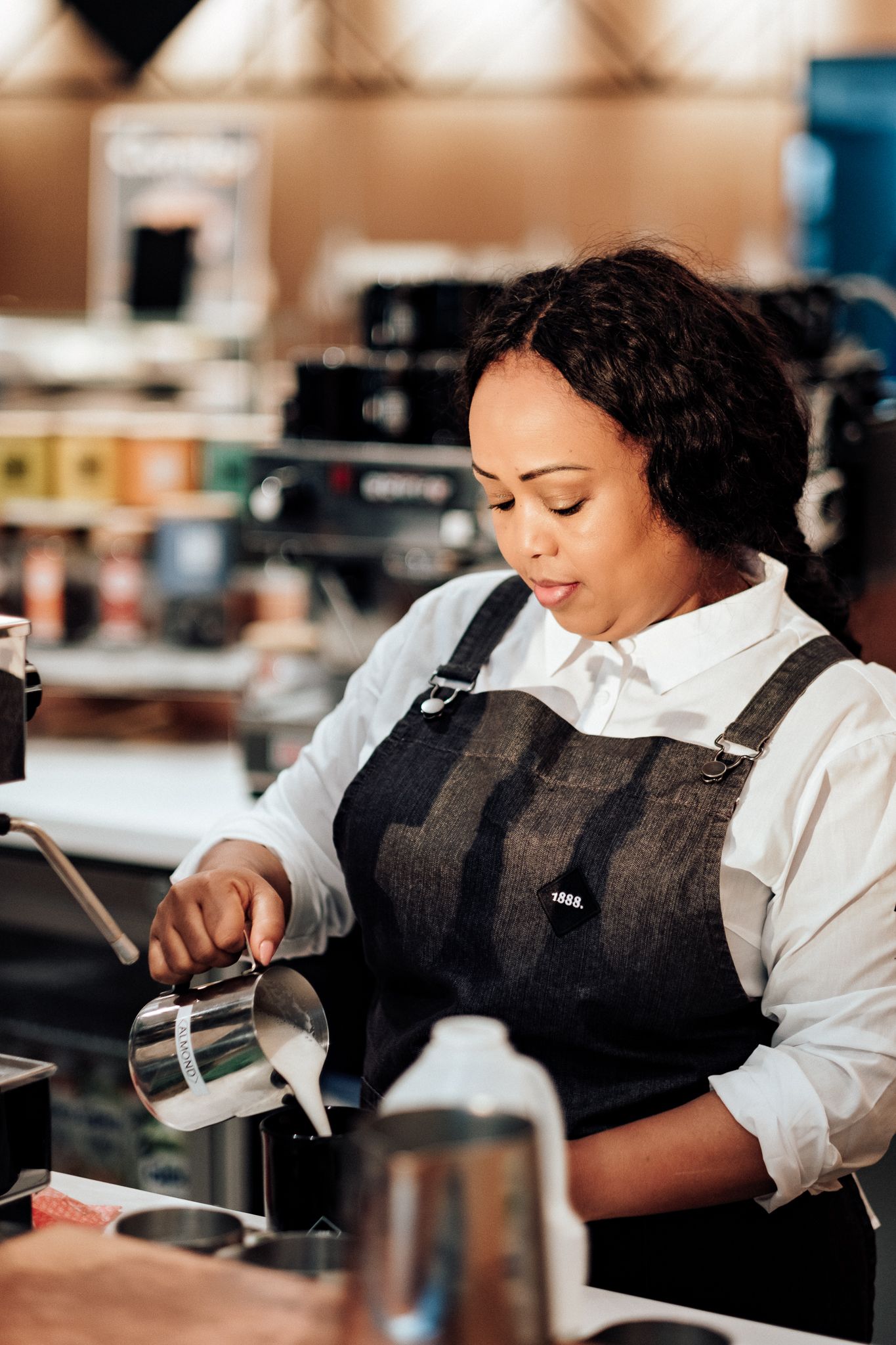 brand photography in London – professional barista portrait inside coffee shop