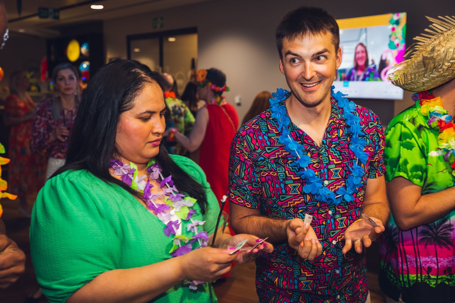corporate hospitality photography in London – relaxed networking at tropical themed event