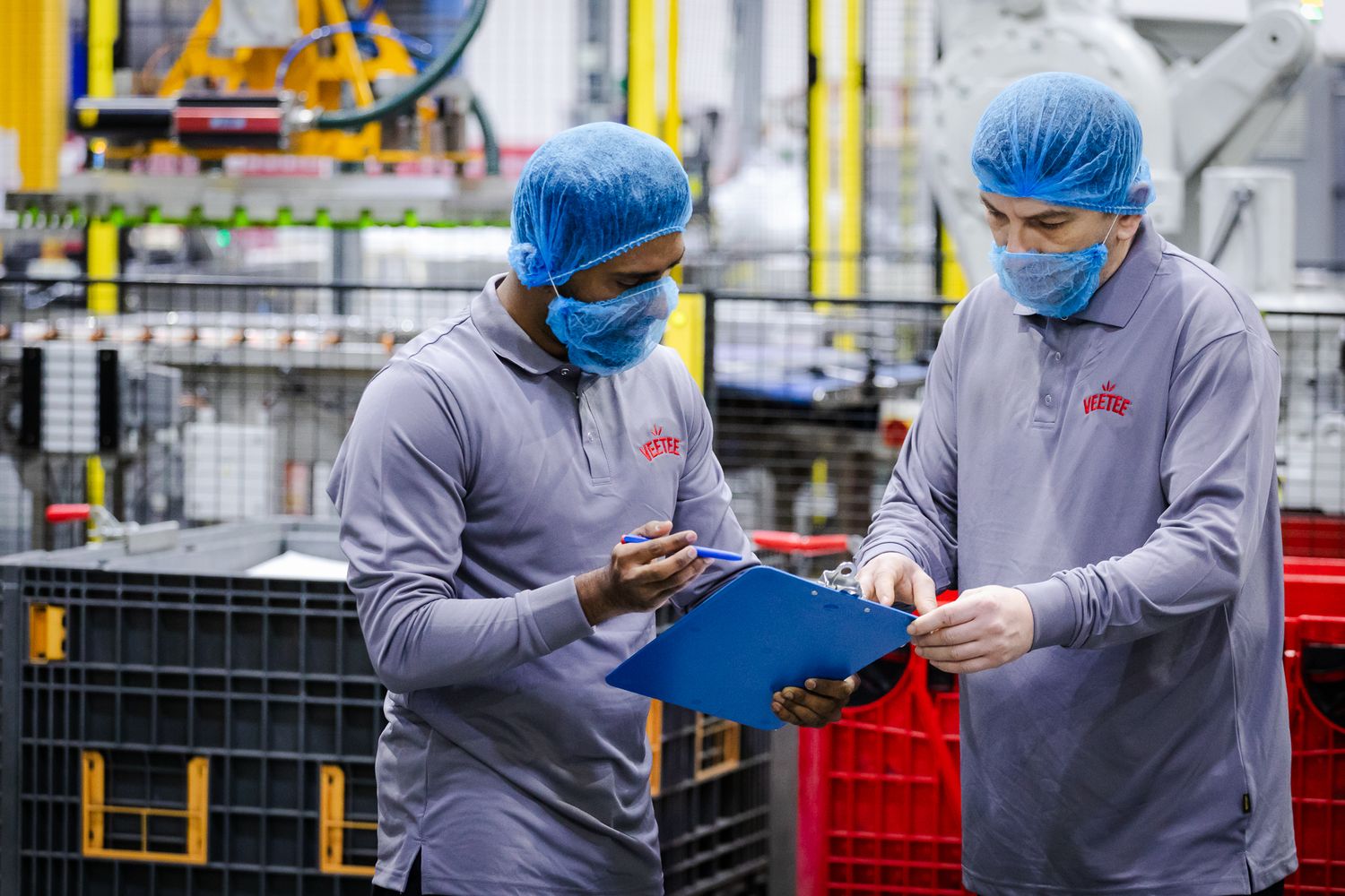 factory environment photography in Kent – workers inspecting rice quality