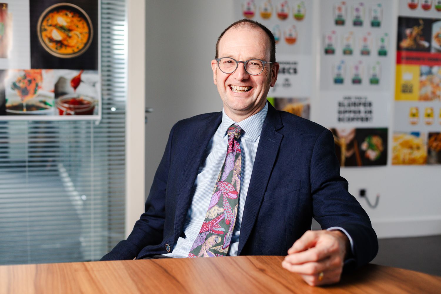 corporate portrait photography in Kent – professional businessman seated in modern office