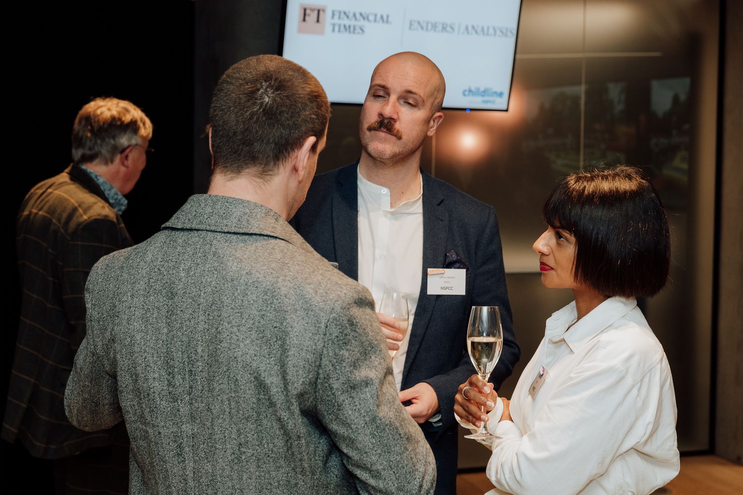 corporate charity event photography in London – guests during indoor reception