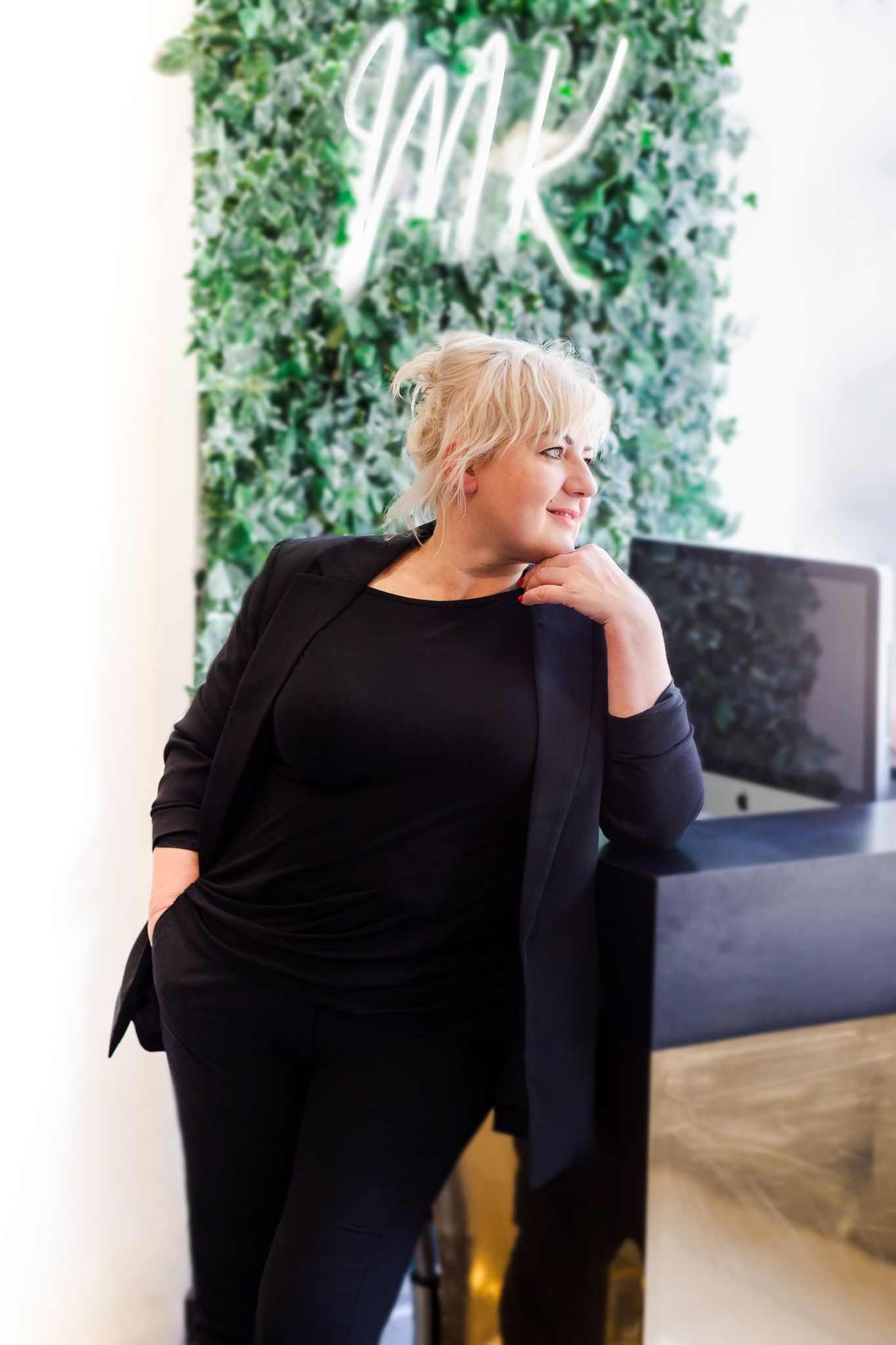 personal branding photography in London – confident female entrepreneur in modern workspace