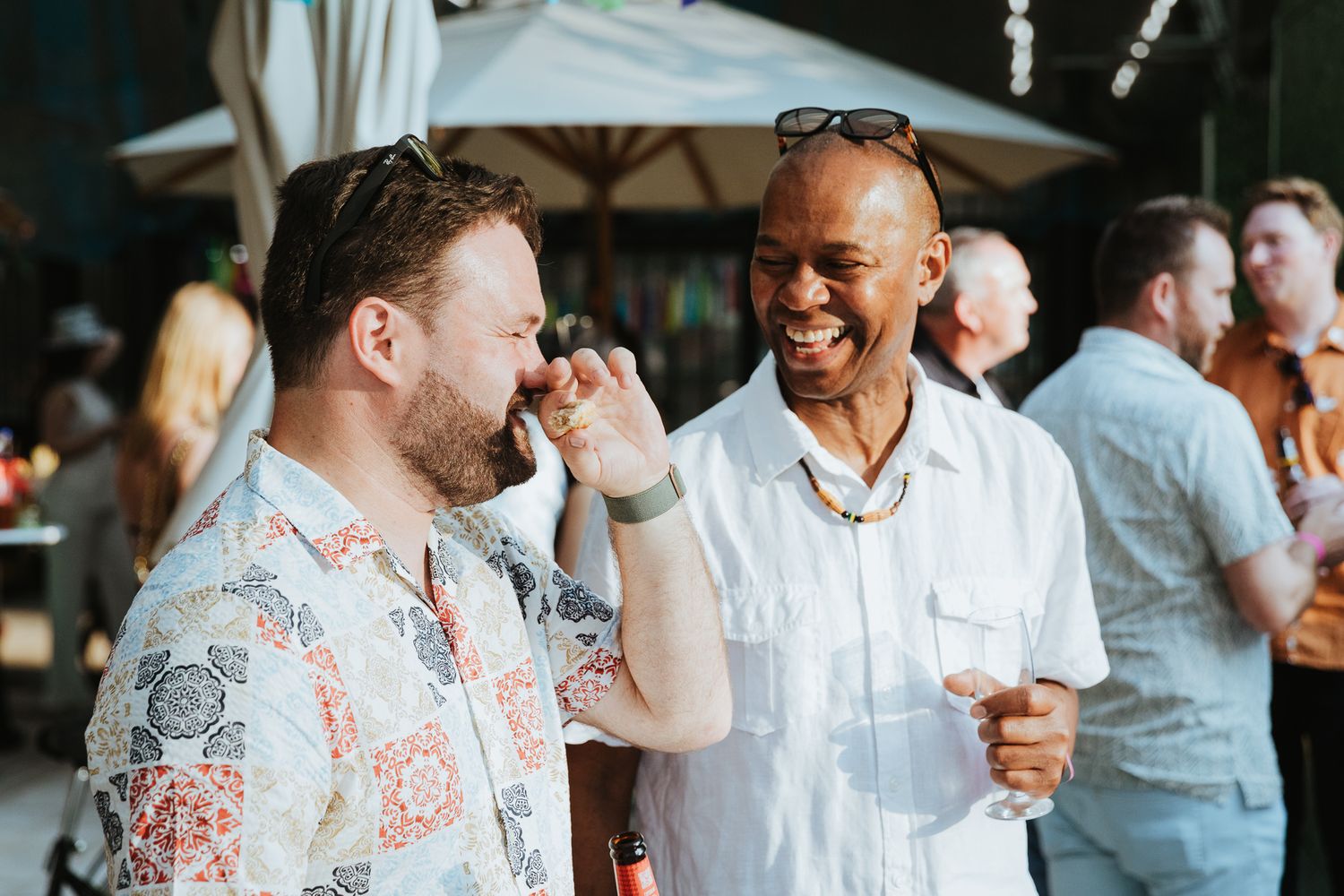 summer employee party photography in London – team members laughing together