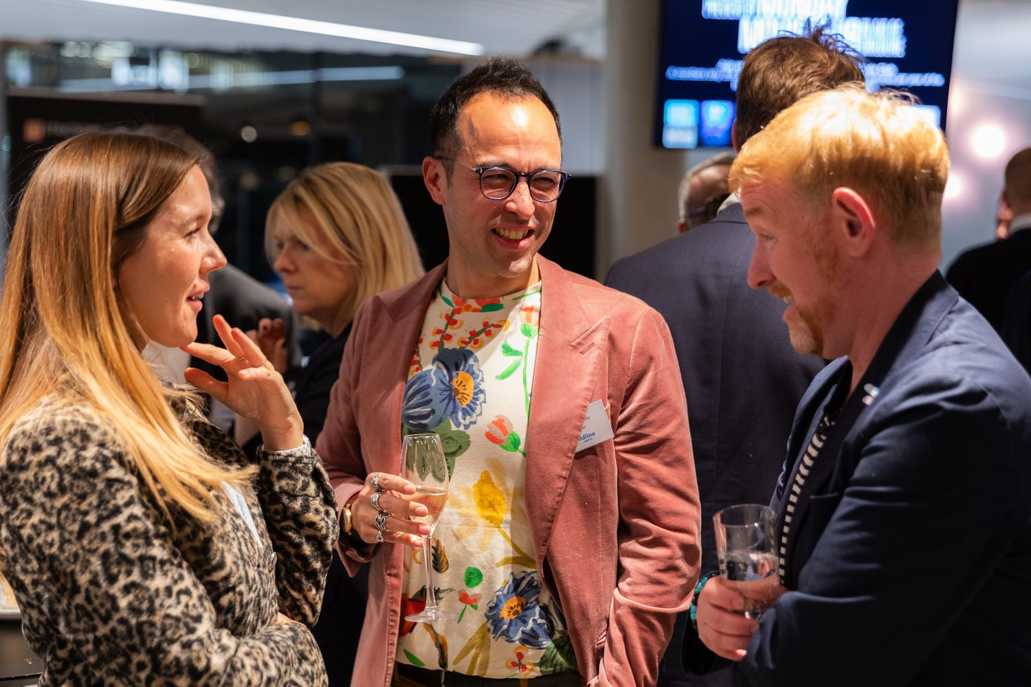 charity gala photography in London – guests enjoying drinks inside event space