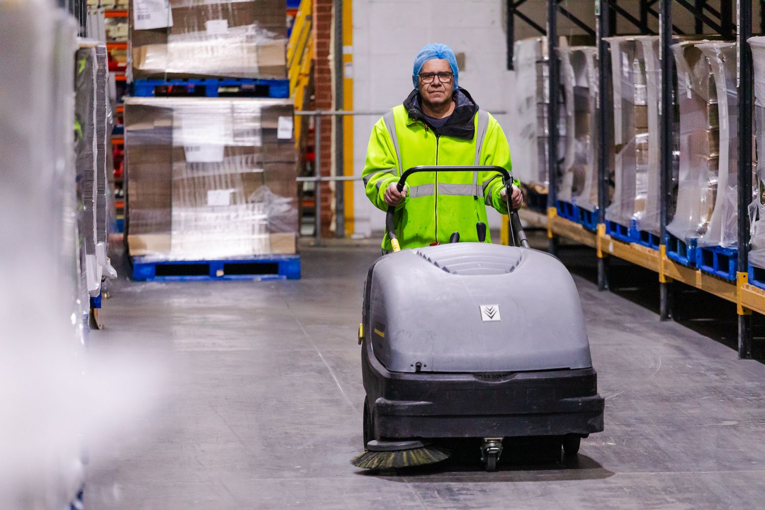 industrial workplace photography in Kent – worker supervising machinery