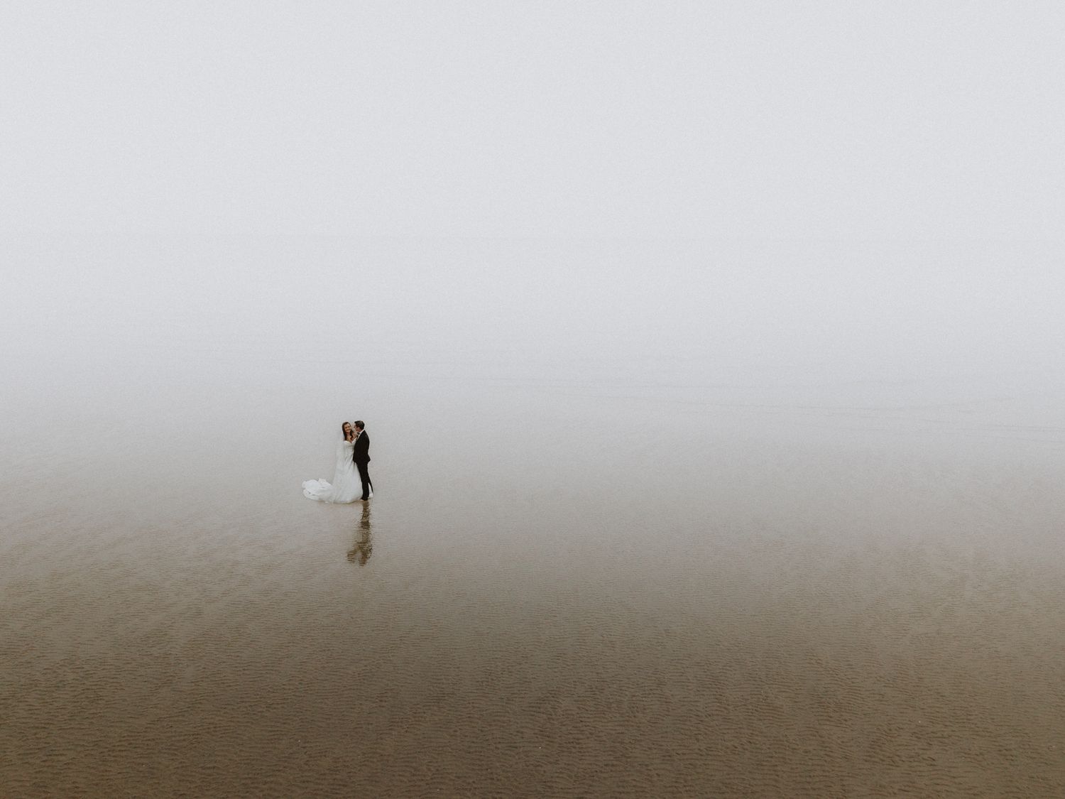 seaside wedding photography in Kent – bride and groom alone by the sea