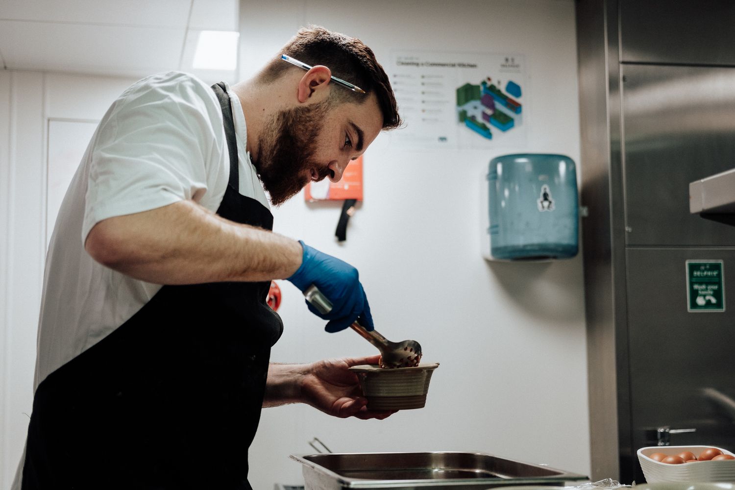 hospitality photography in London – team preparing dishes in commercial kitchen