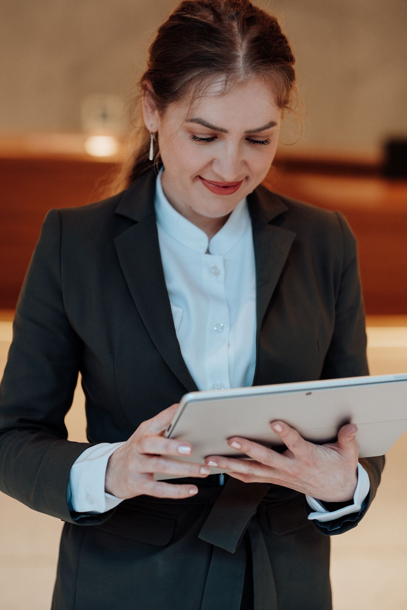 personal branding photography in Kent – professional business portrait of woman in corporate setting