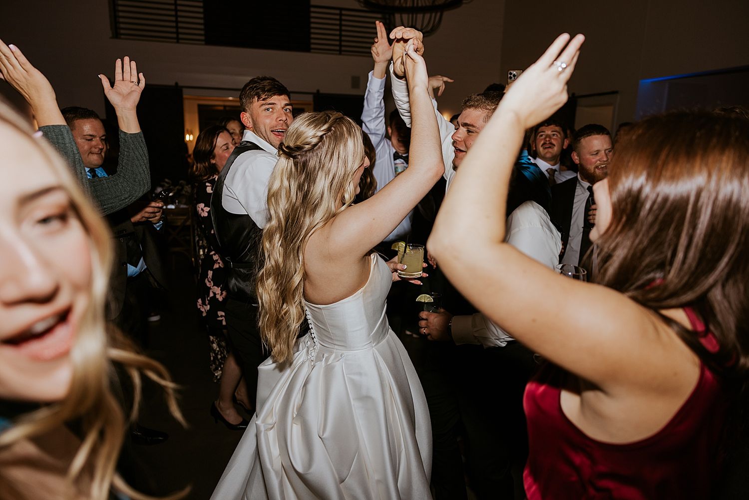 Bride and groom dancing with their guests at a New Hampshire wedding