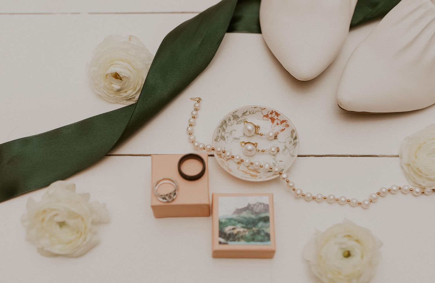 Flat lay image of the smallest details from Deirdre and Brodie's wedding day at The Preserve in Tamworth New Hampshire.