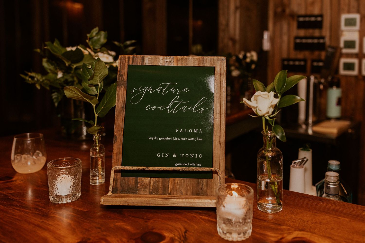 A sign for the signature cocktail by the bar.