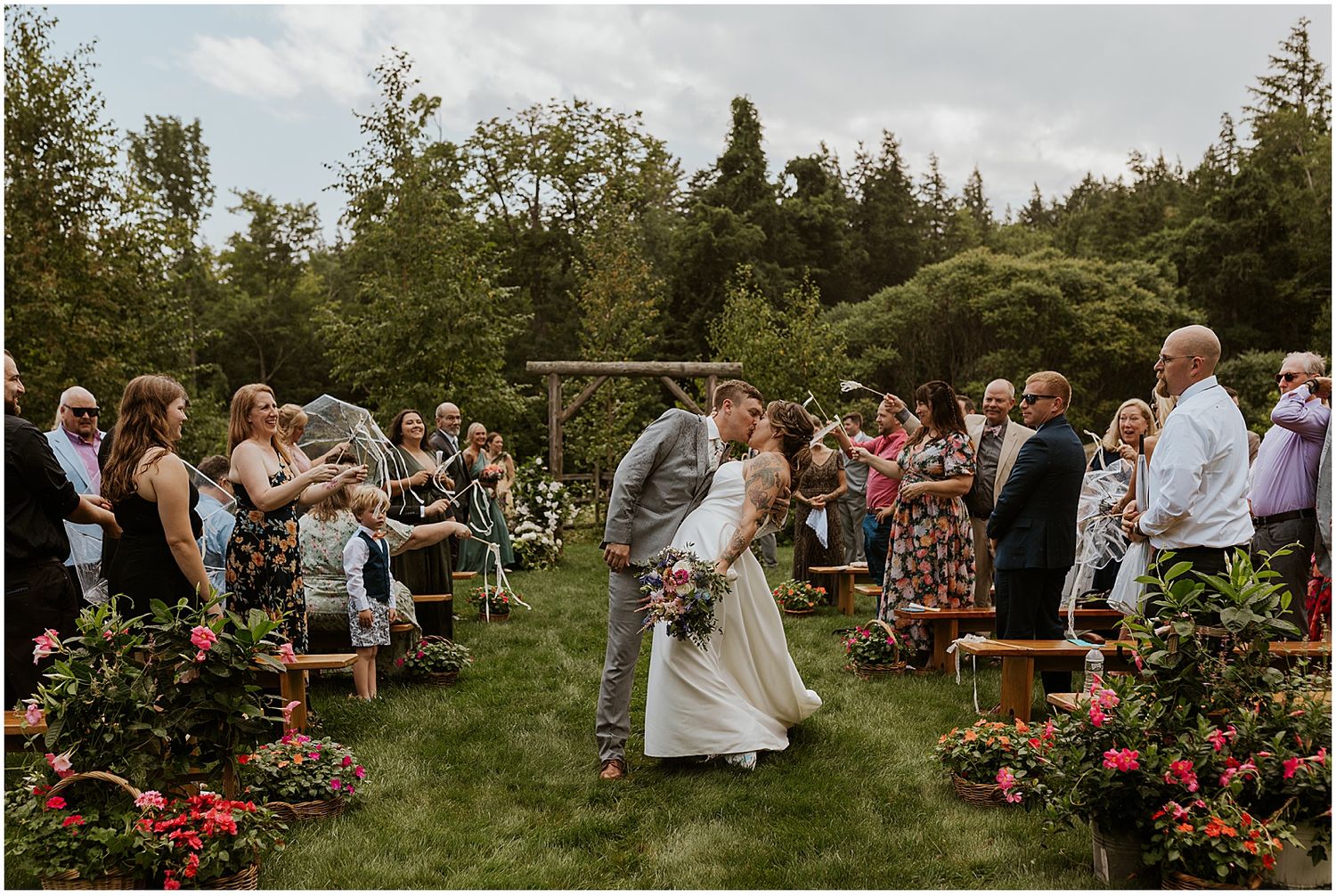 Couple at their wedding ceremony at NH outdoor wedding venue Locke Falls Farm