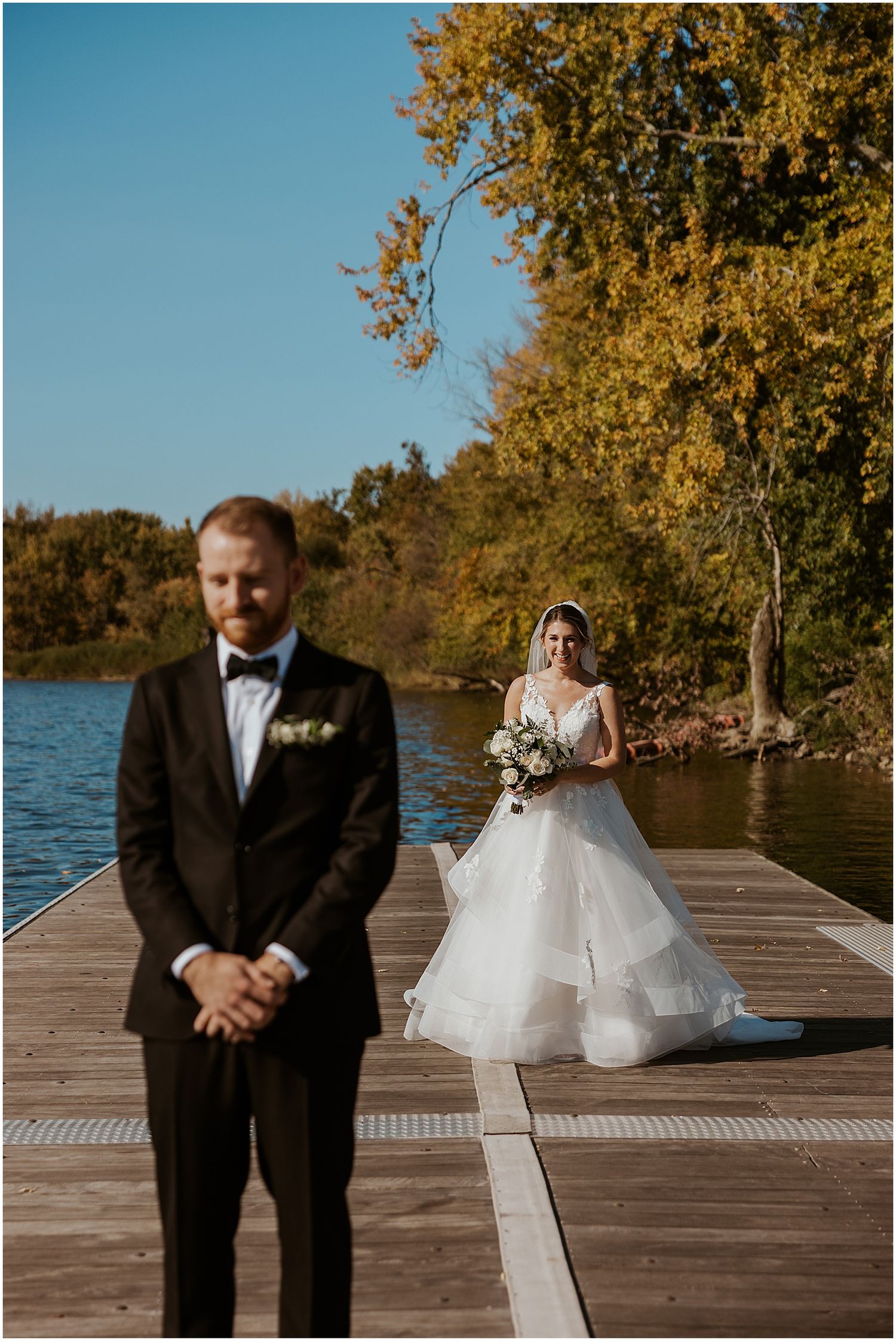 Bride and groom sharing a first look at their Connecticut fall wedding
