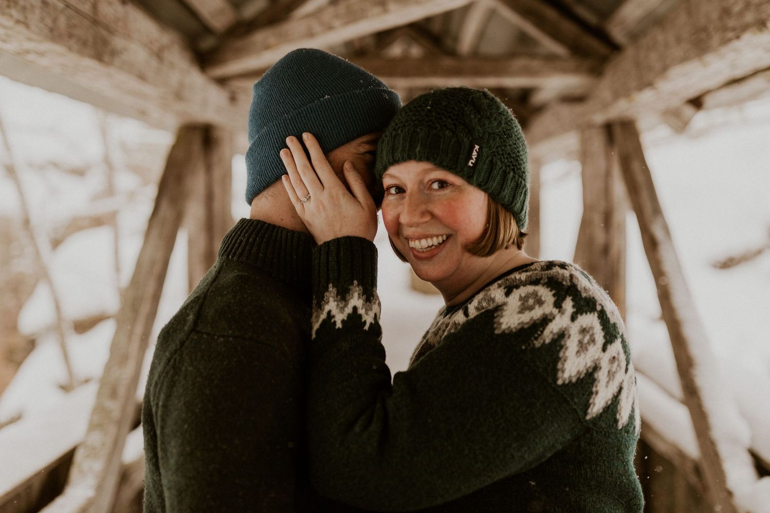 Taylor and Ken snuggling up together in a White Mountain National Forest Shelter while hiking the Flume Gorge in NH.