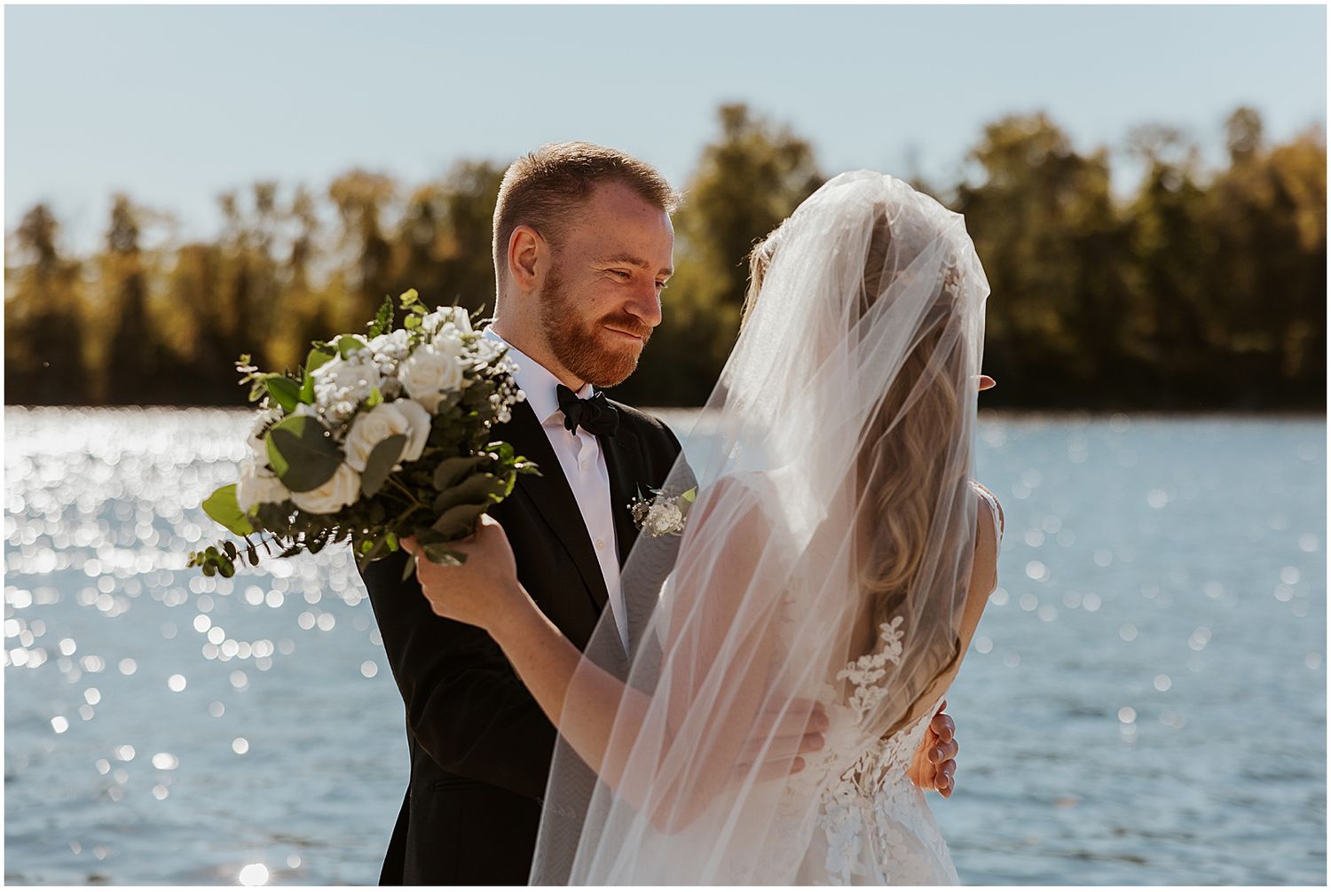 Bride and groom having a first look at their fall New England wedding