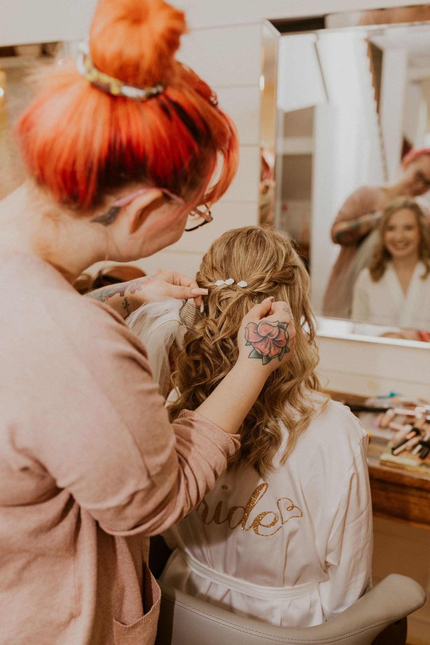 Final touches being put on Deirdre's hair.