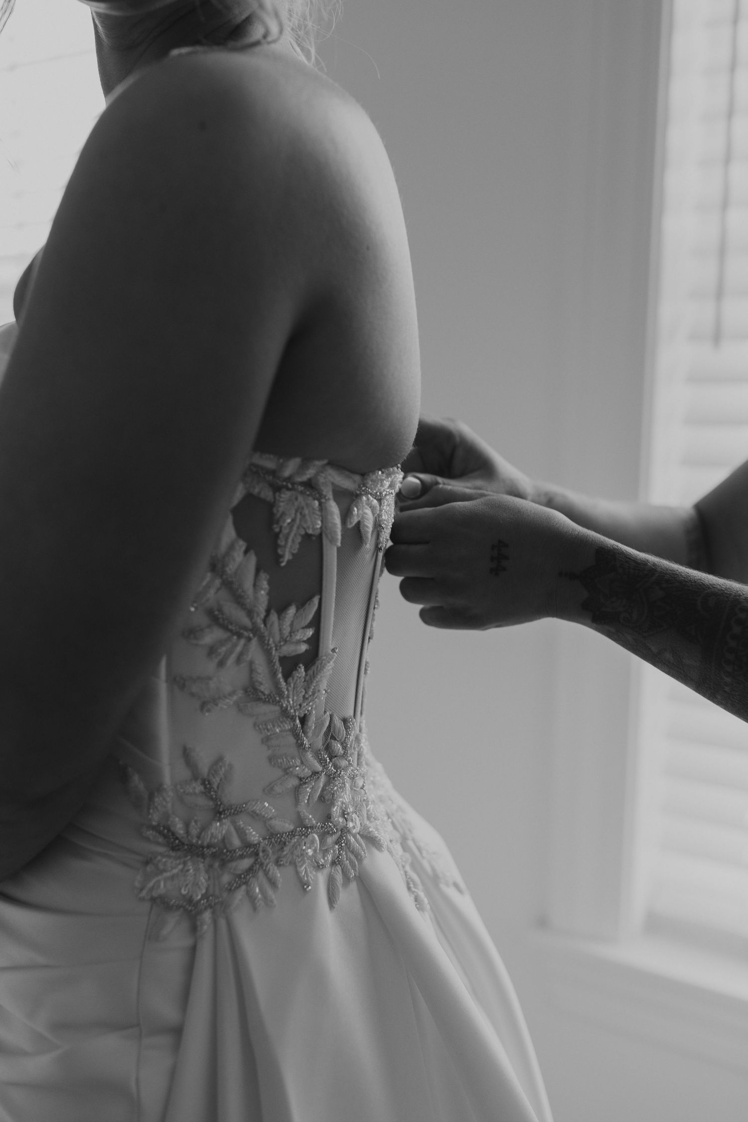 Kendra getting ready for the wedding ceremony at Owl's Nest Resort Lake House.