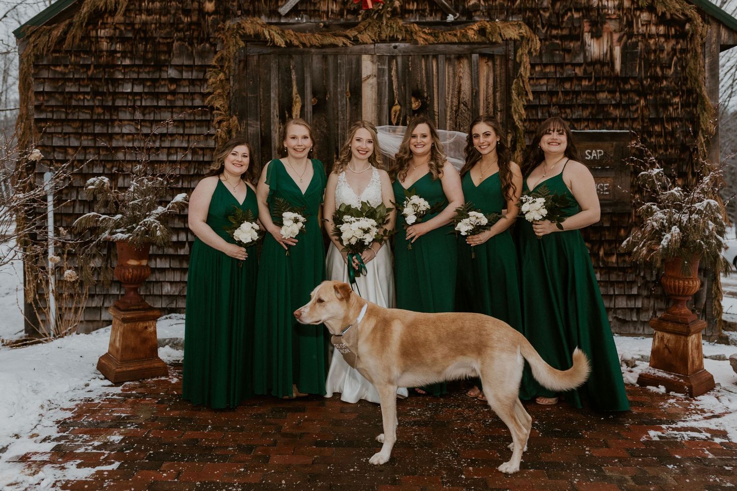 Deirdre and her bridesmaids posing for portraits after the wedding ceremony in Tamworth New Hampshire.