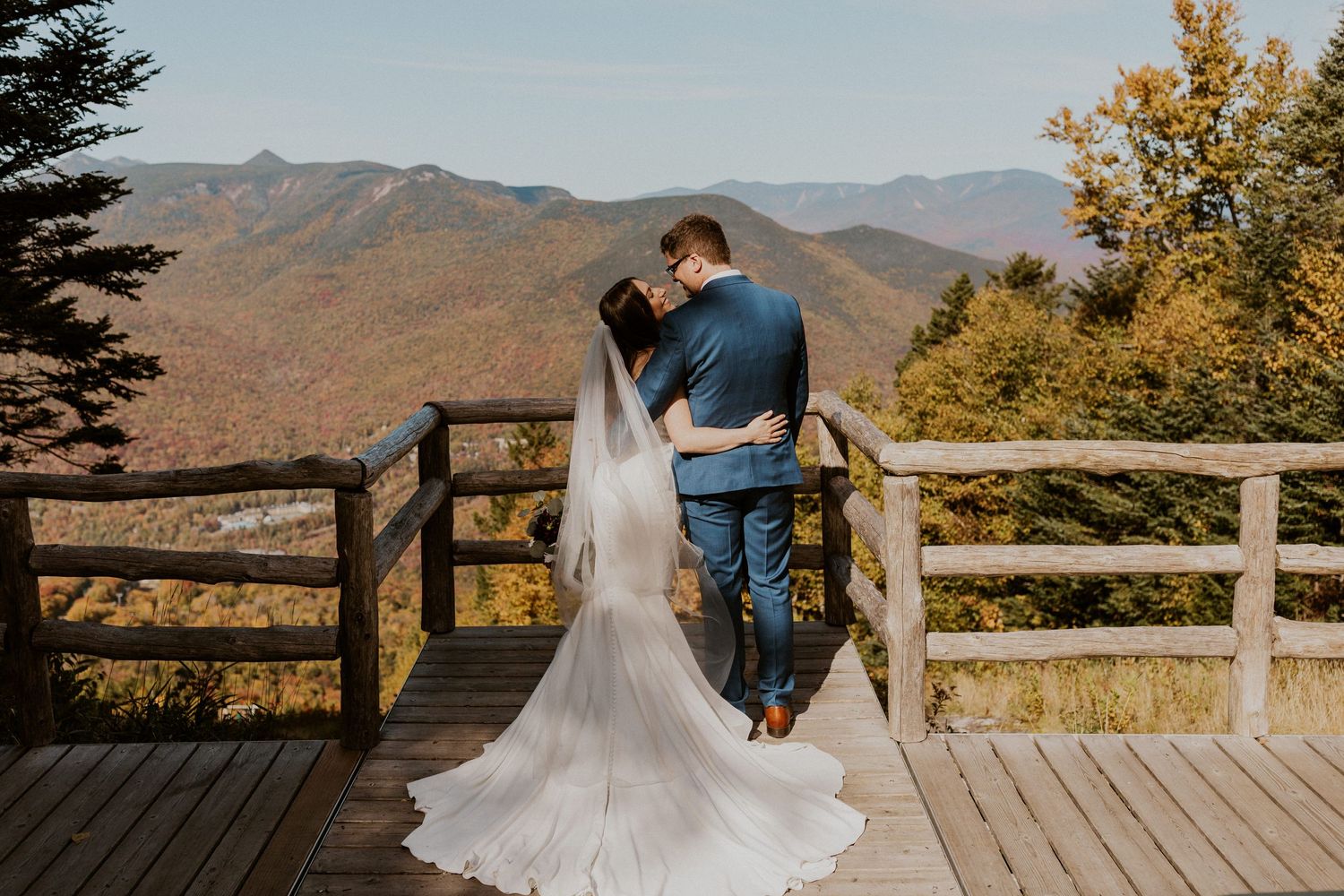 Portraits of the newlyweds on top of Loon Mountain after their fall wedding ceremony.