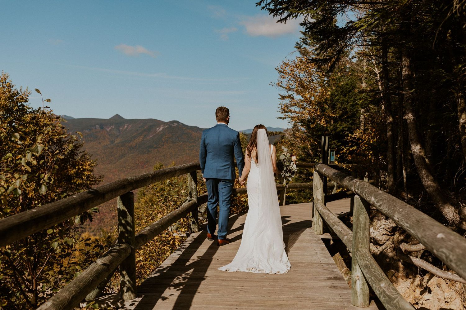 Portraits of the newlyweds on top of Loon Mountain after their fall wedding ceremony.