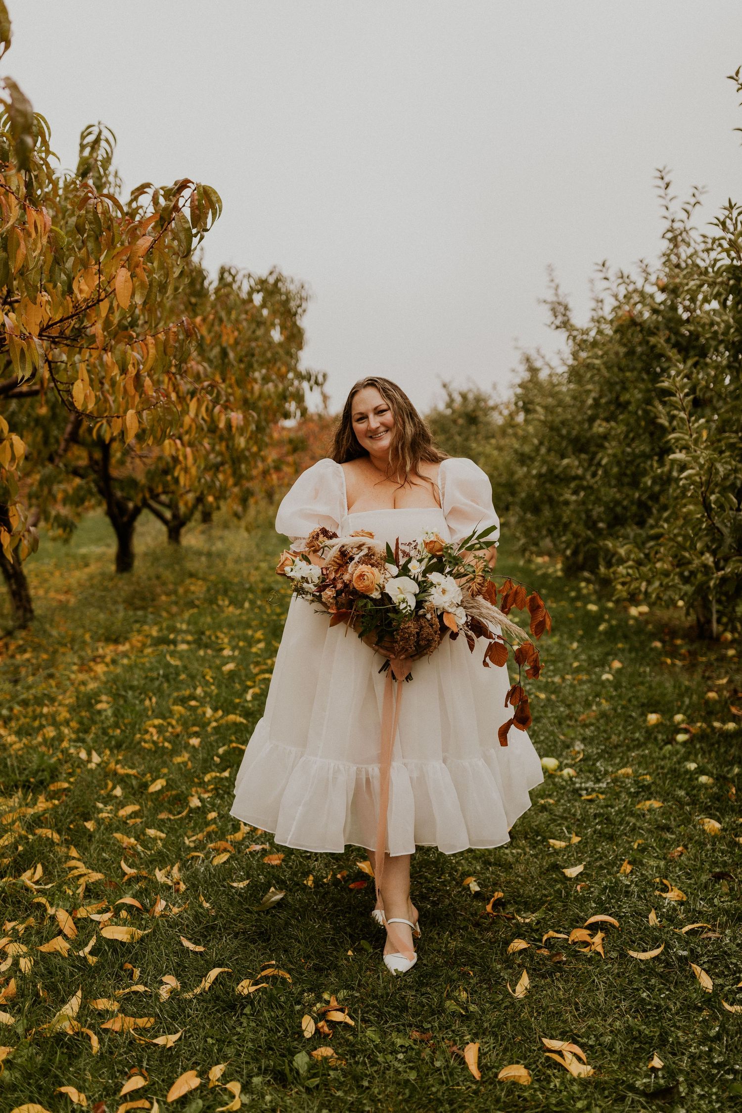 A portrait of Terise on their elopement day in Concord New Hampshire.