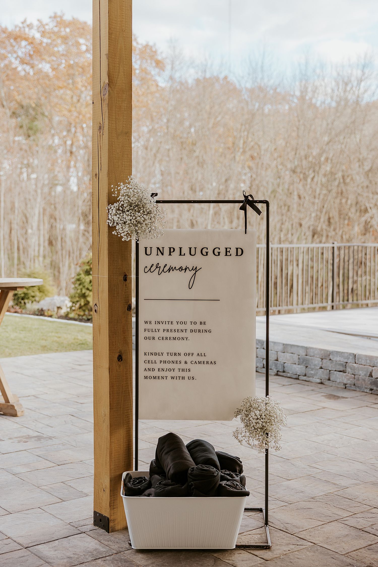 Wedding ceremony signage for a fall wedding at Hyla Brook Estate in NH