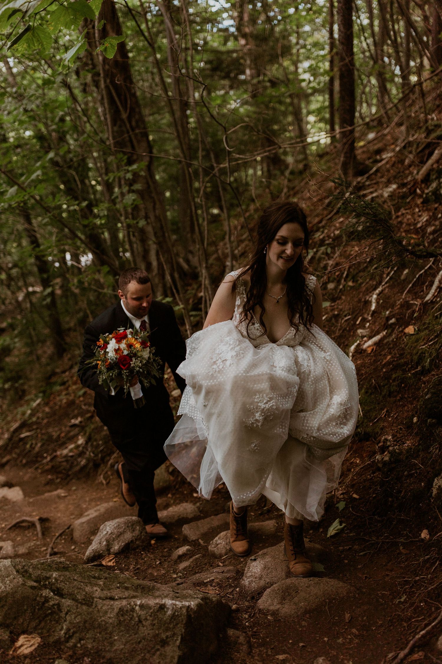 The bride and groom on their way up to the top of Artist Bluff for adventure portraits.