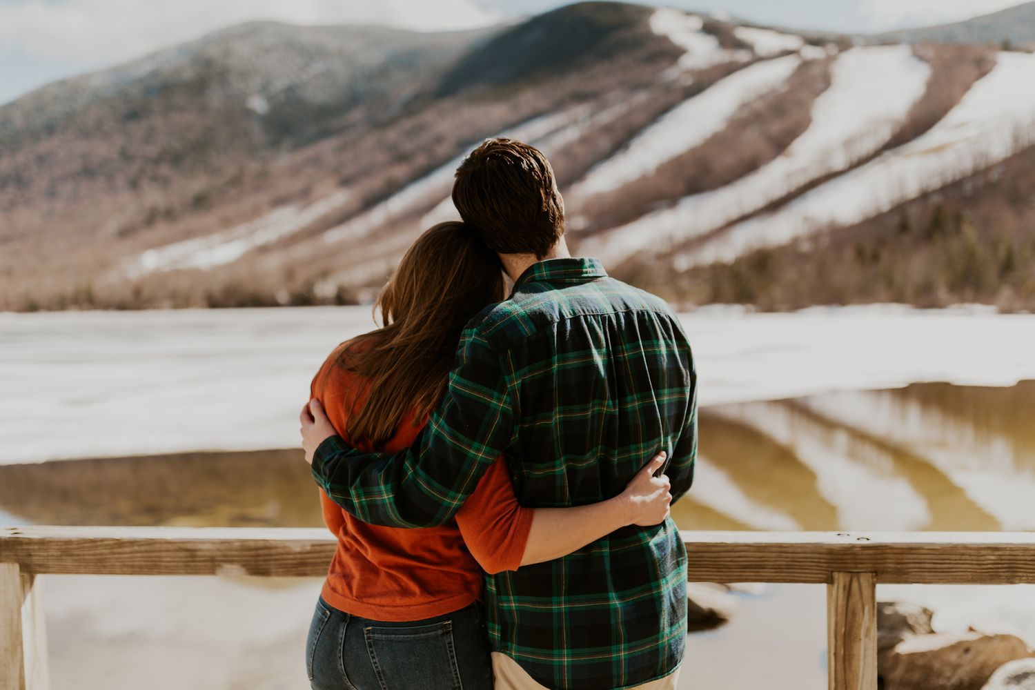 A happy couple enjoying the view of Echo Lake in Franconia Notch State Park