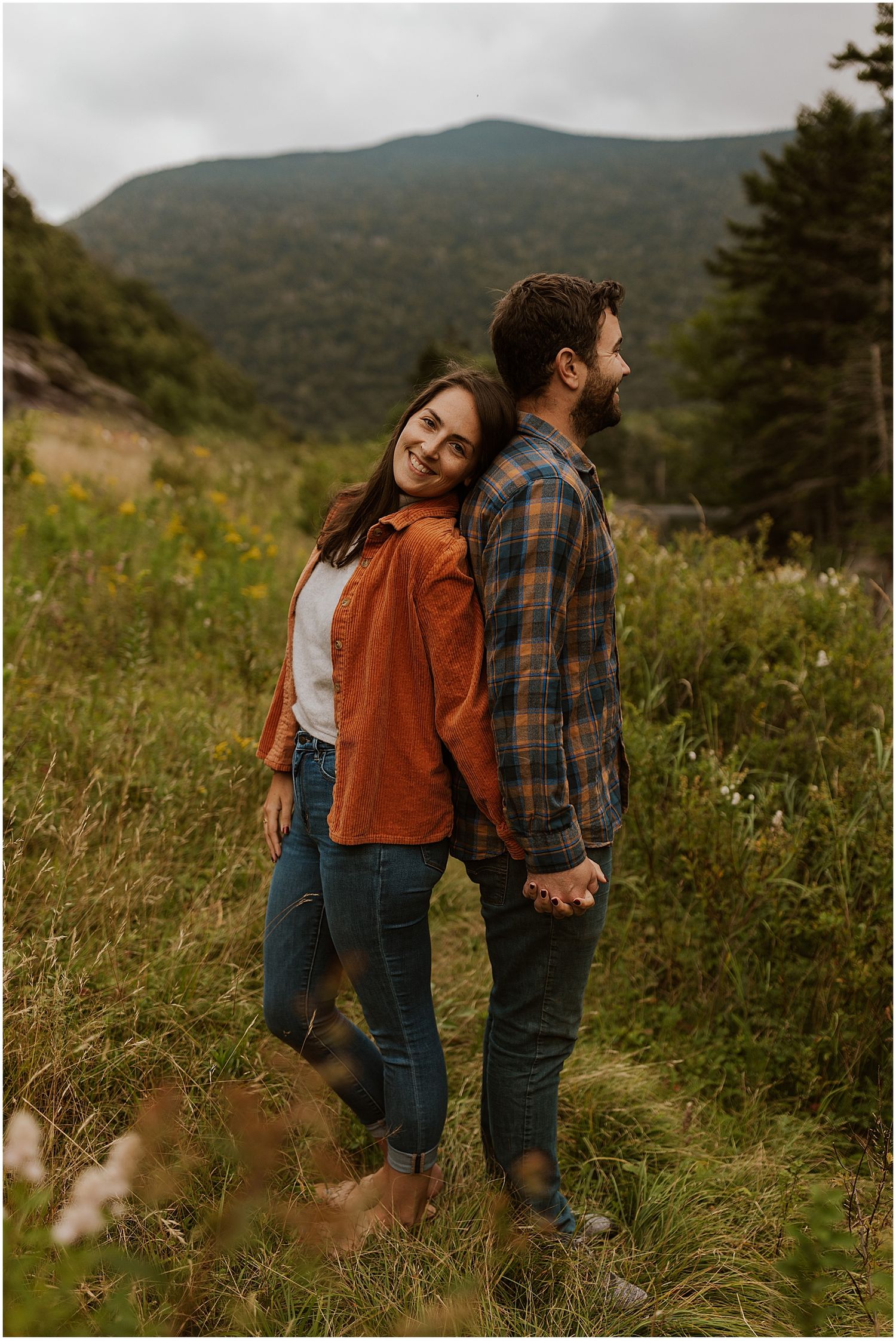 NH couple taking engagement photos while camping in the White Mountains