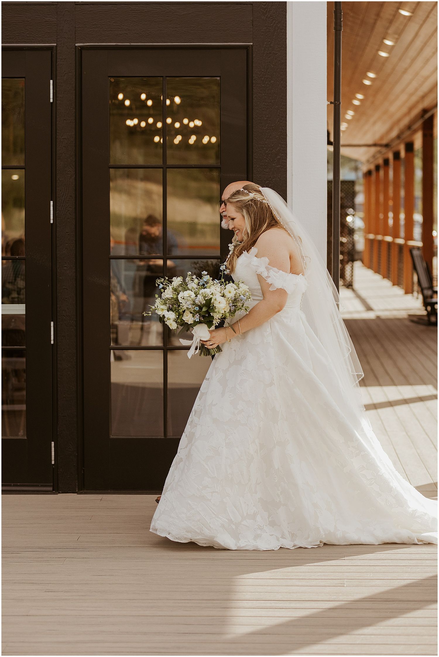 bride walking down the aisle at her Owls Nest Resort wedding