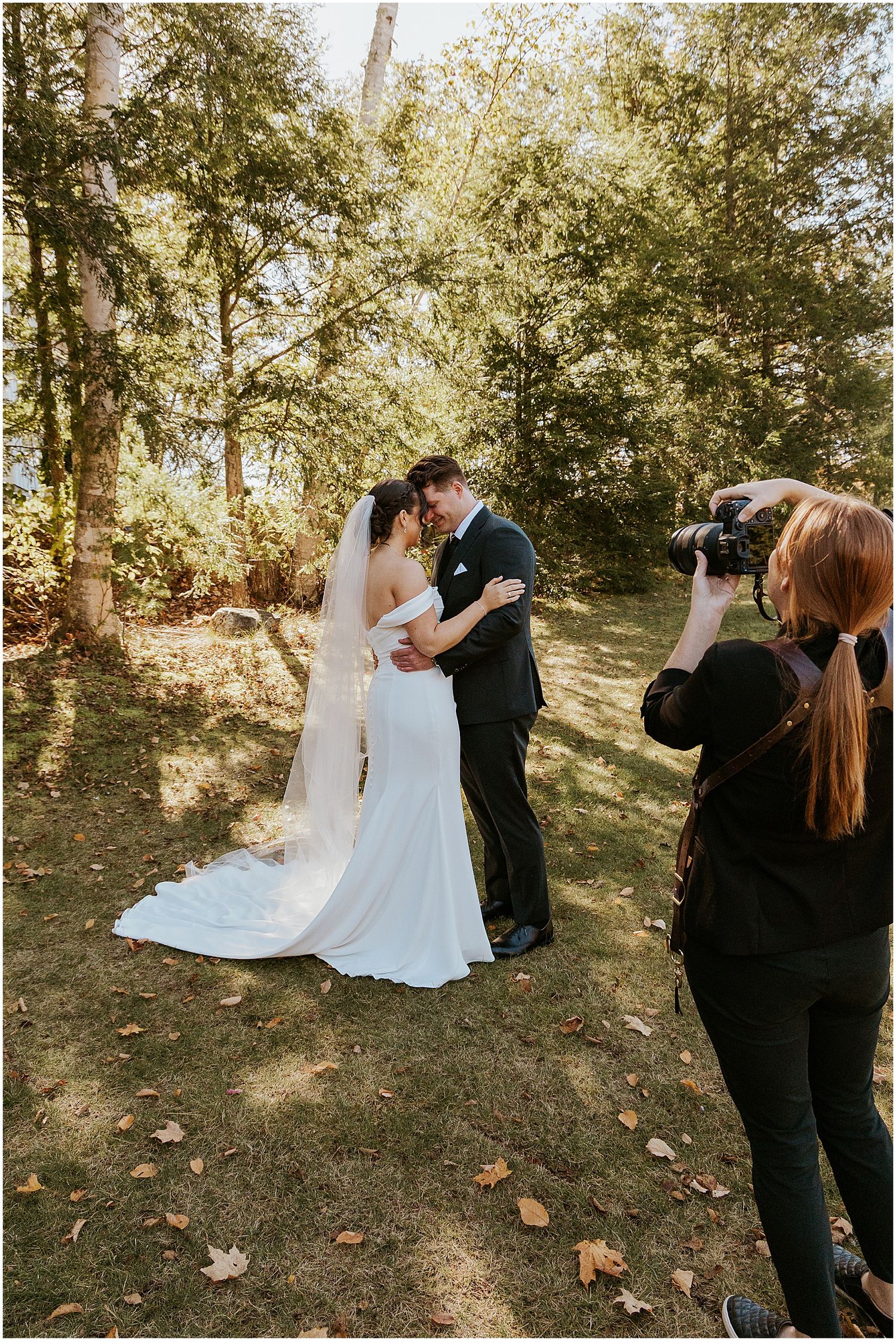 NH wedding photographer Robin Easler photographing a bride and groom