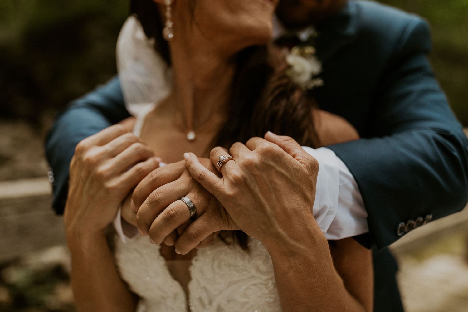 Close-up details of wedding couple's intimate moments.