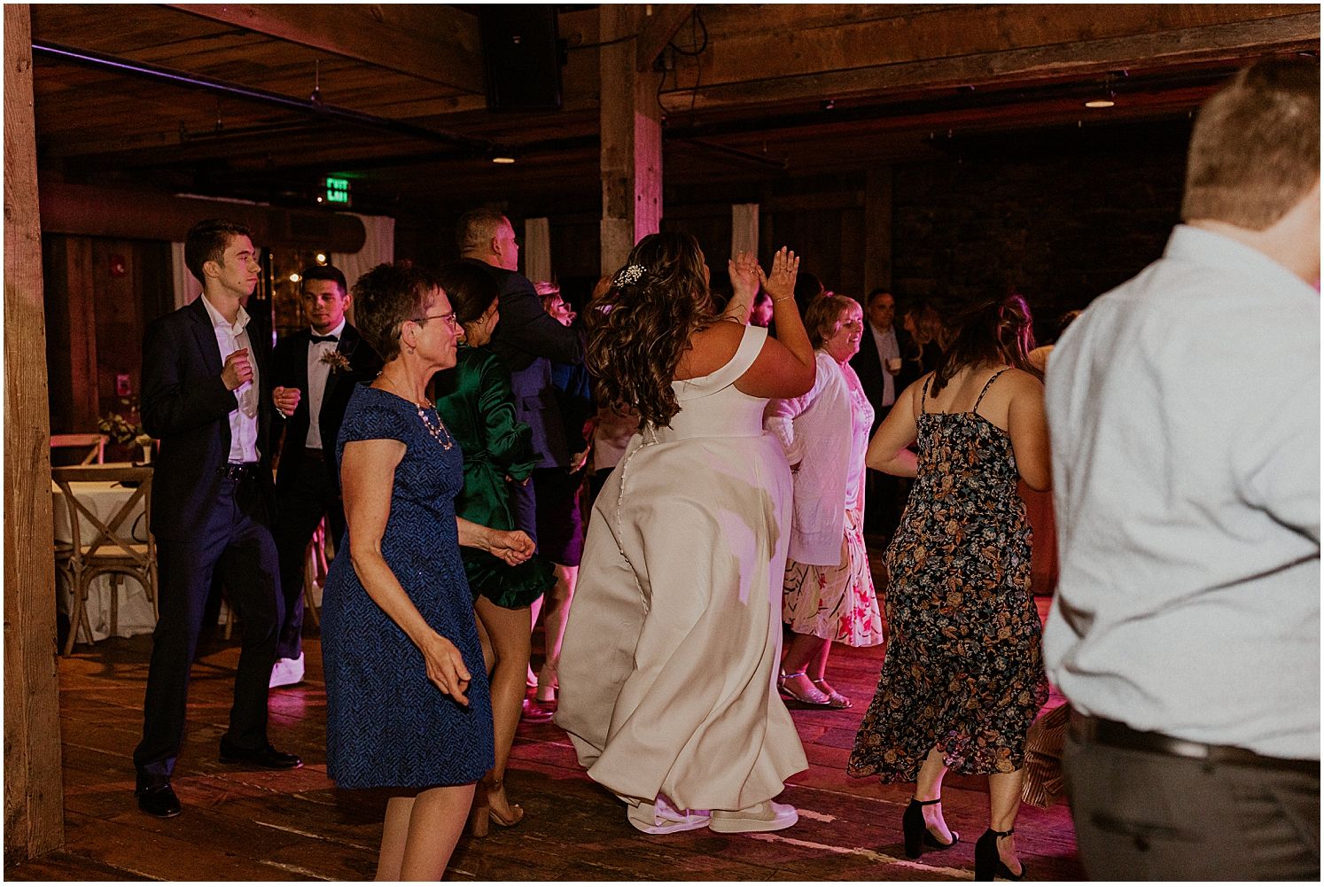 Bride dancing with guests at NH wedding