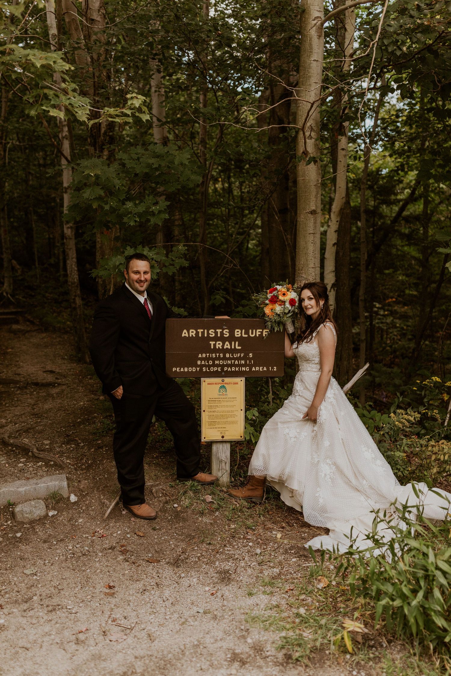 The bride and groom on their way up to the top of Artist Bluff for adventure portraits.