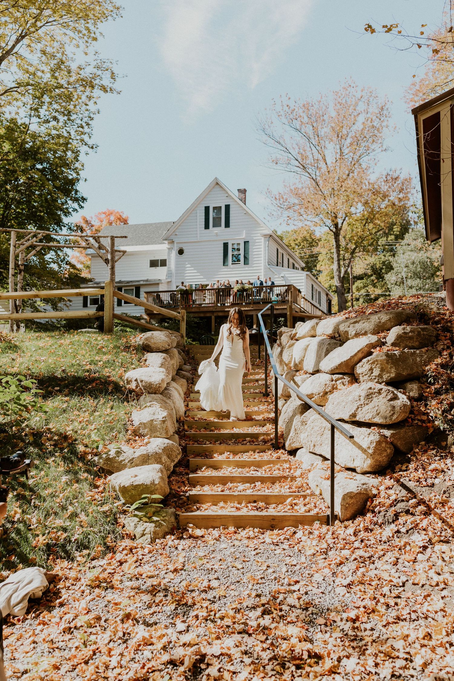 Briana walking down to the Pemi River banking to meet Daniel for their first look.