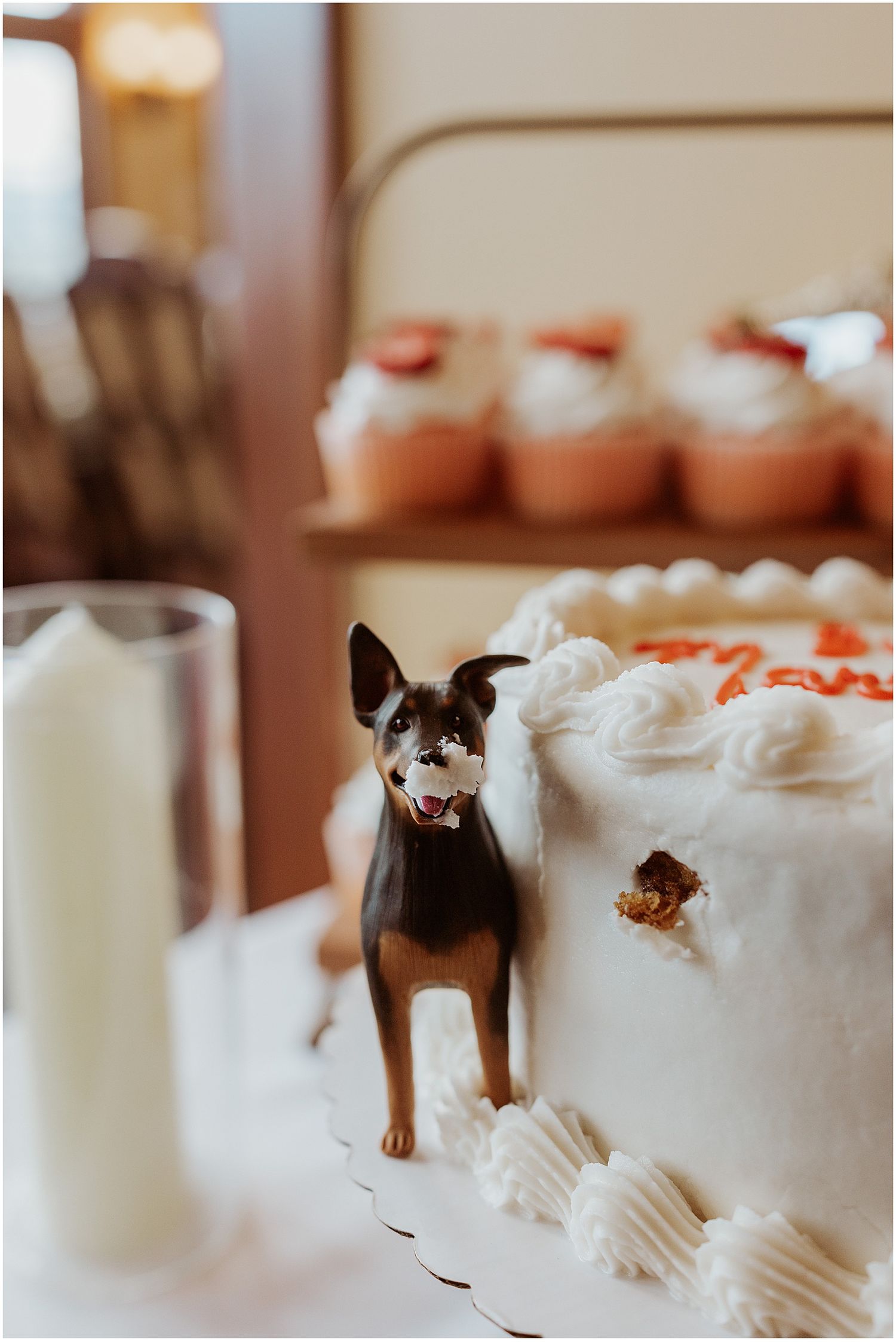 Vintage wedding cake with a dog cake topper for a Maine VRBO wedding