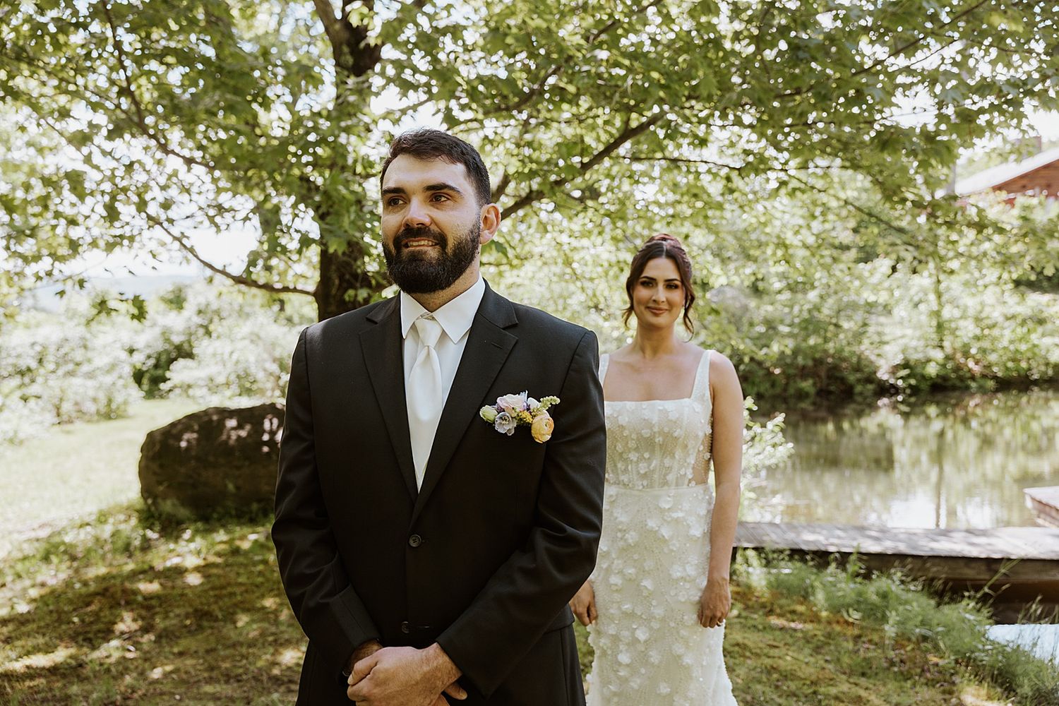 Bride and groom having their first look at Longlook Farm in NH
