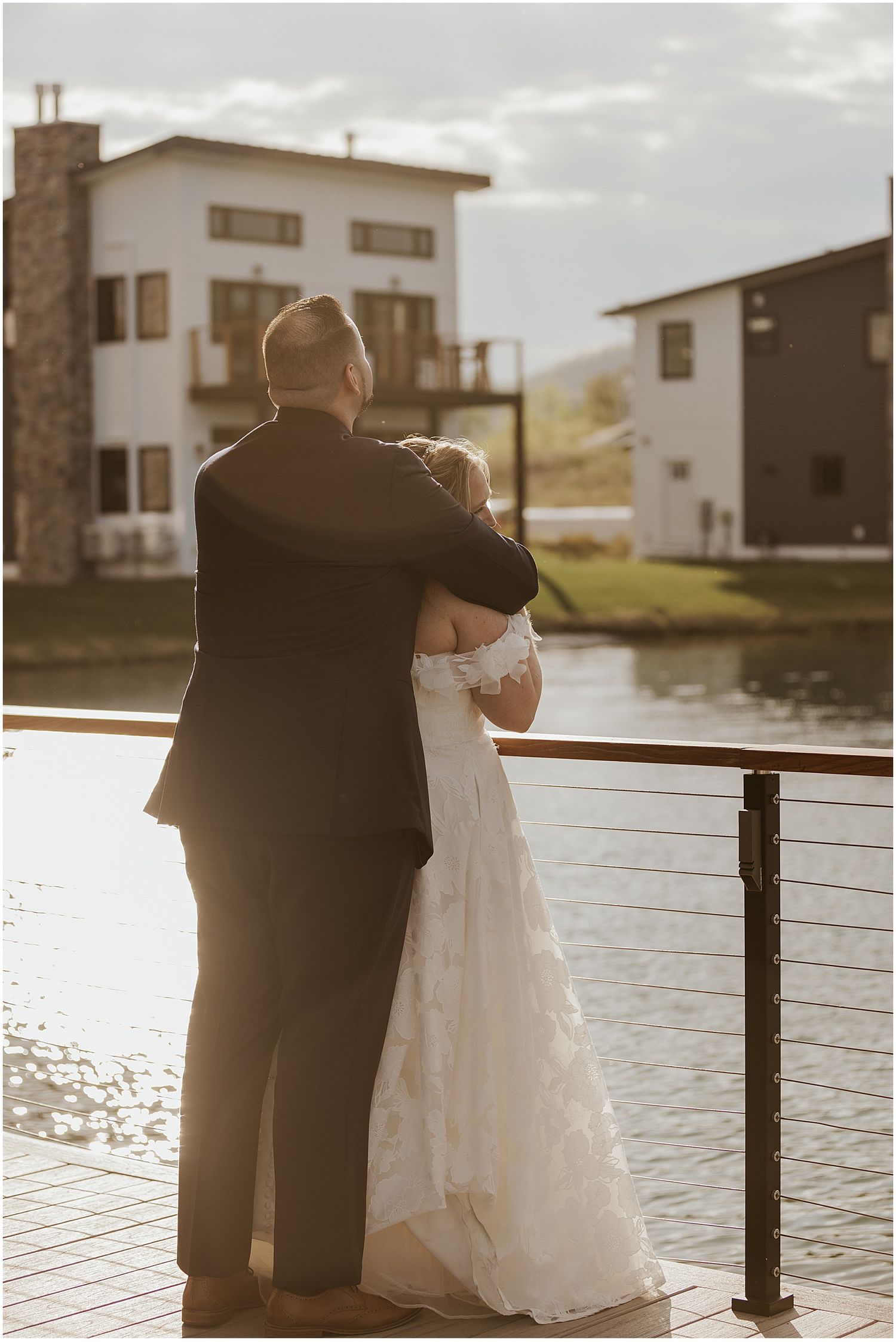 Bride and groom taking sunset portrait photos at the Owl's Nest Resort