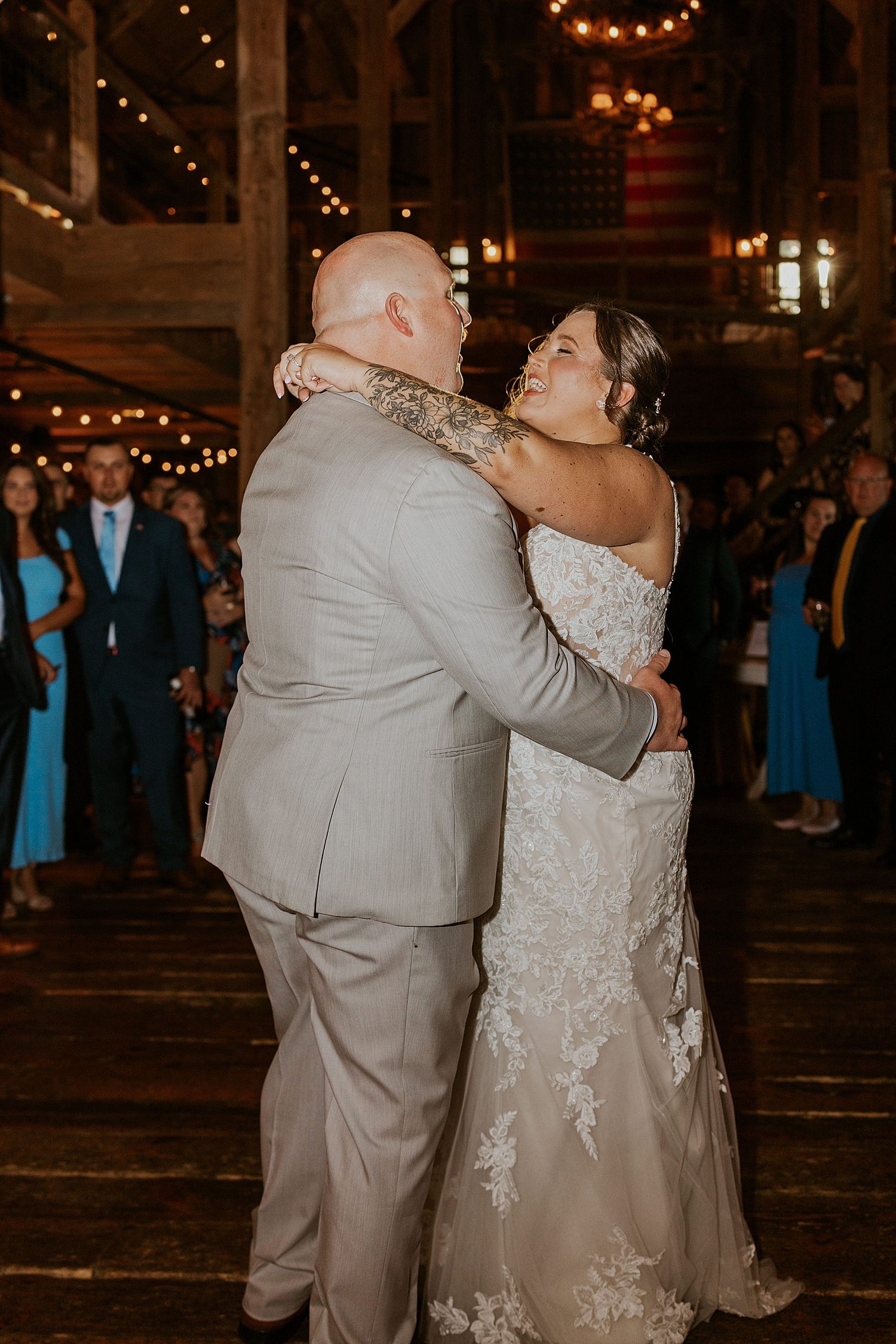 Bride and groom having their first dance at their NH barn wedding - wedding photography advice