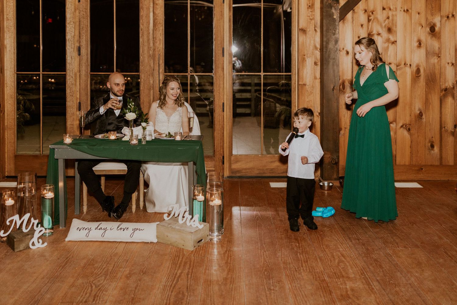 Colby and his mother giving a toast at the wedding reception.
