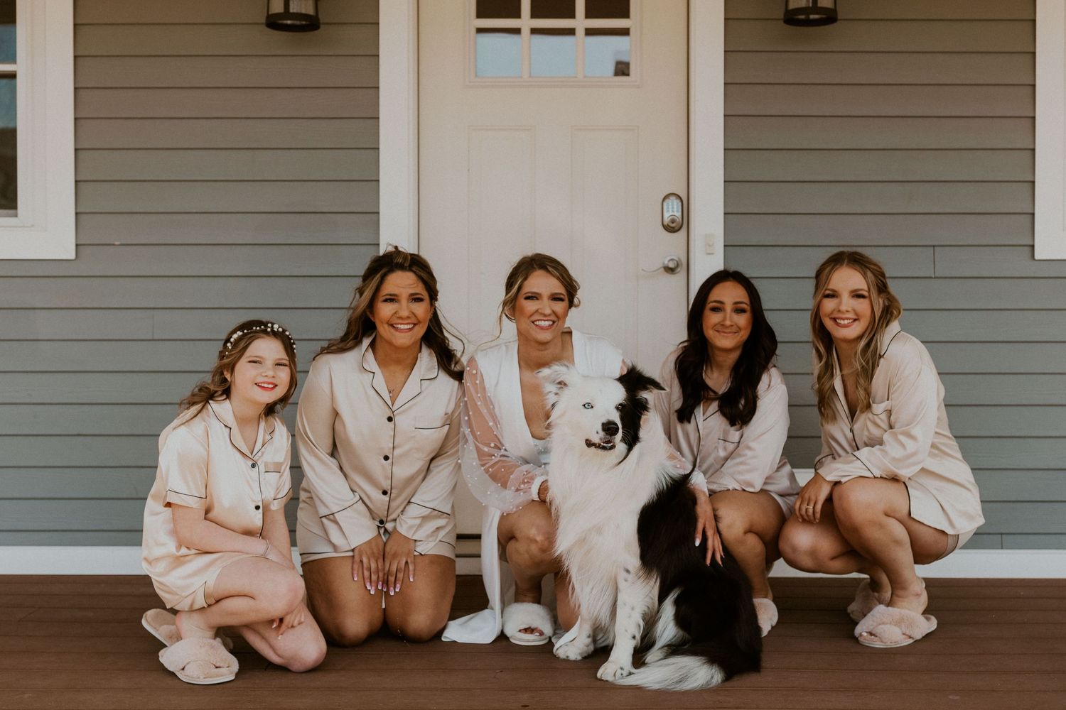Kendra and her girls posing for a pajama photo with their wedding pup Eagle!