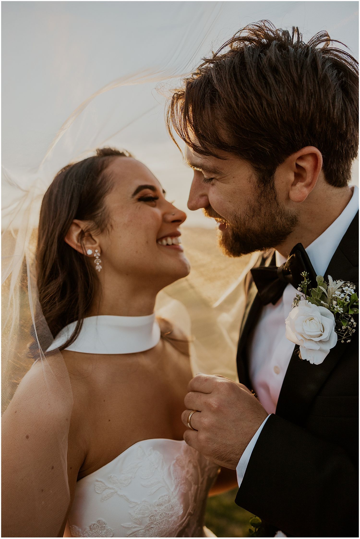 New Hampshire couple taking golden hour wedding photos