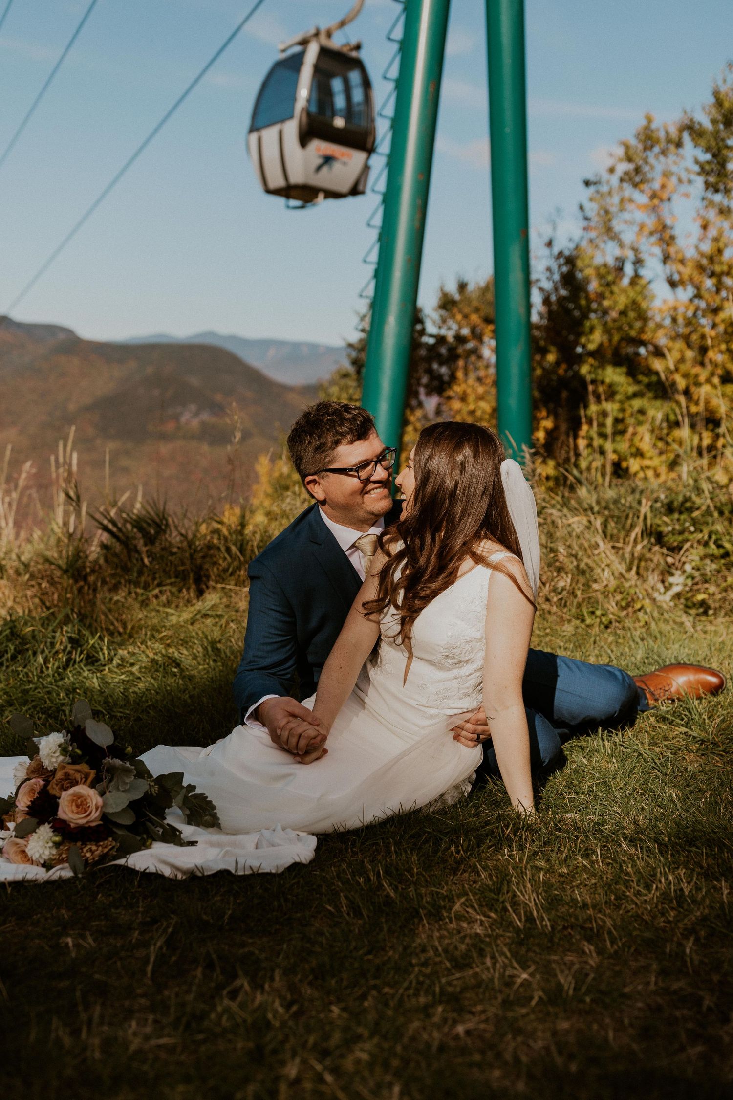 Portraits of the newlyweds on top of Loon Mountain after their fall wedding ceremony.