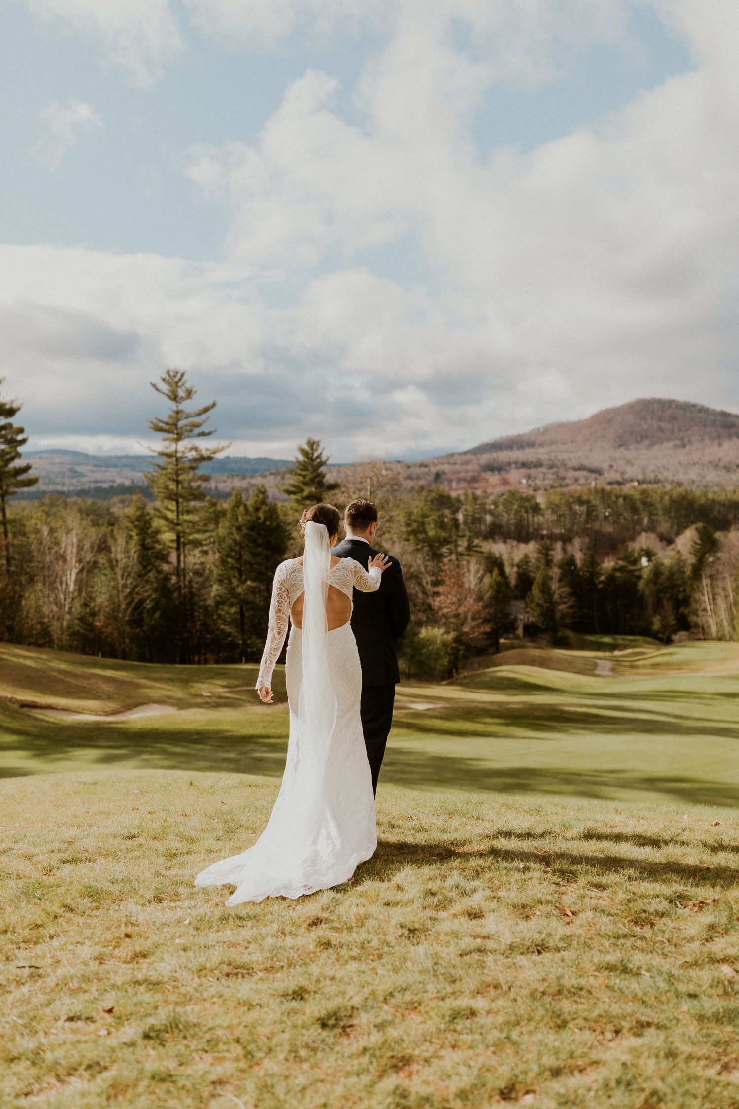 First look shared between bride and groom at the Owl's Nest Resort in Thornton, New Hampshire.