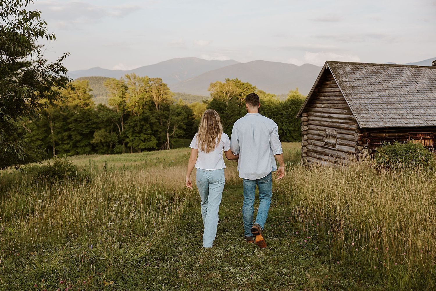 Couple having a New Hampshire photoshoot on a summer day in the White Mountains