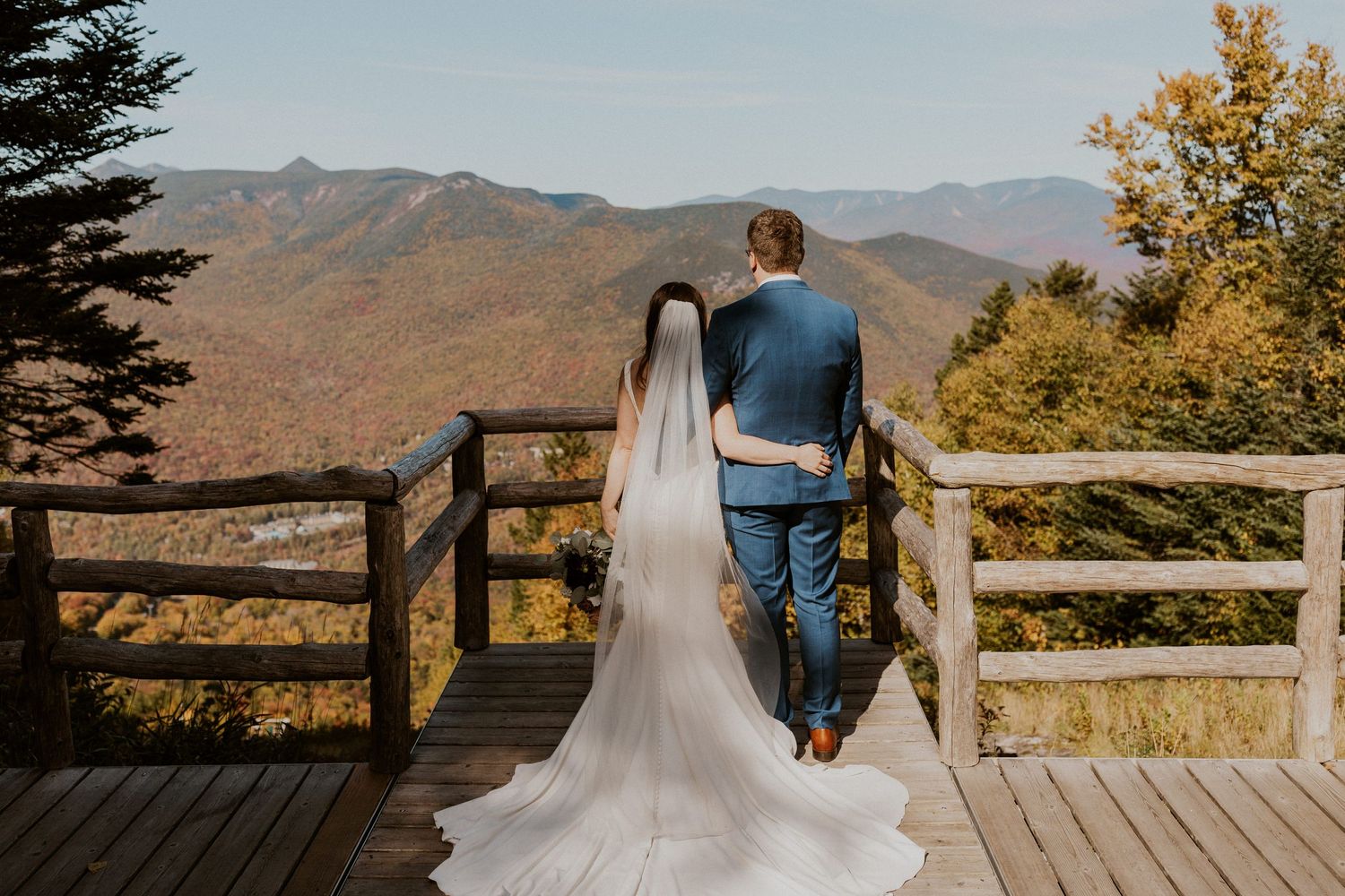 Portraits of the newlyweds on top of Loon Mountain after their fall wedding ceremony.