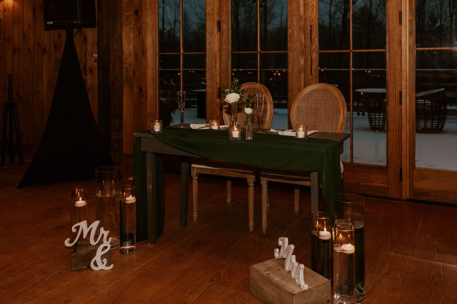Deirdre and Brodie's sweetheart table at their wedding reception in Tamworth New Hampshire.