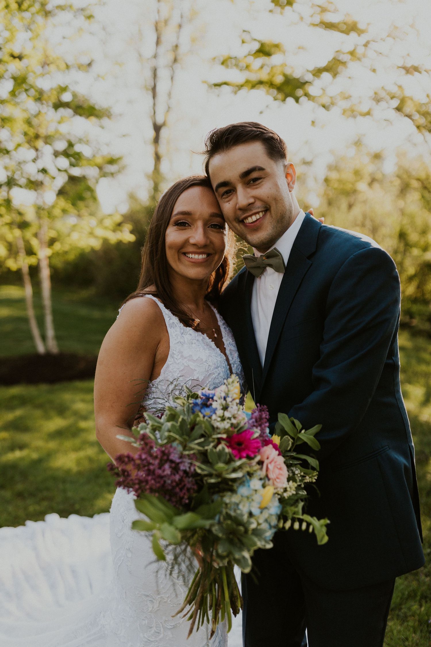 Chrissy and Mike posing for a happy portrait together.